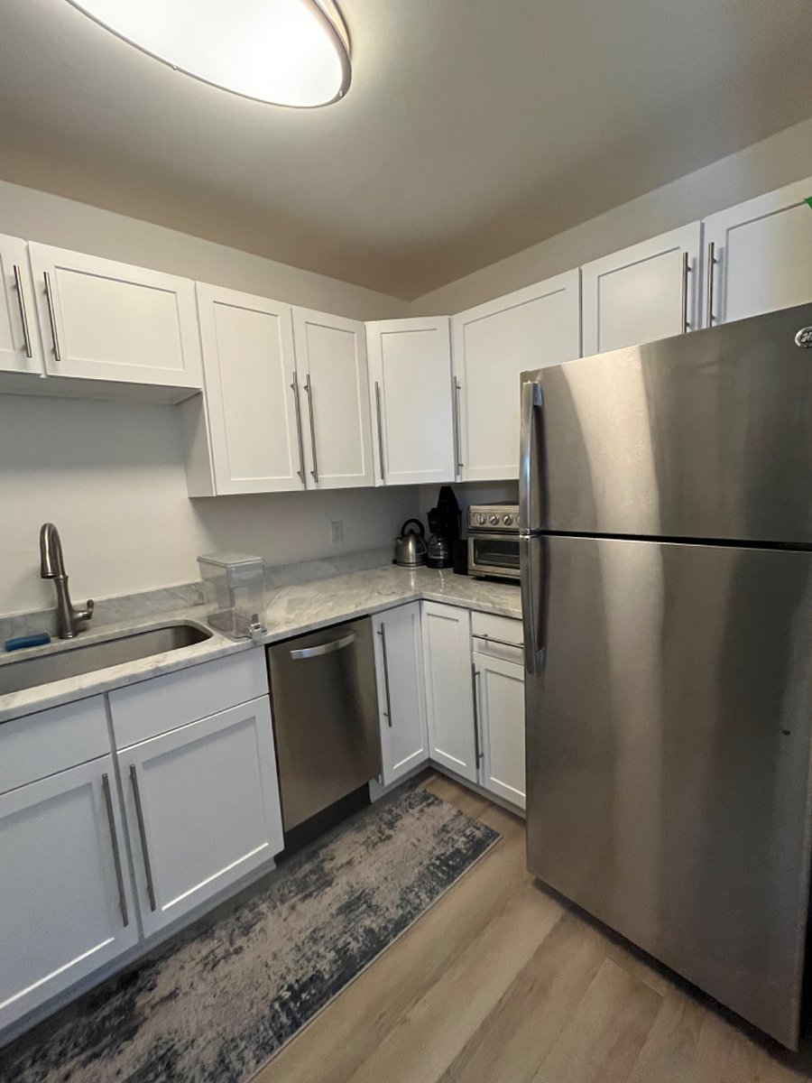 Kitchen, dishwasher, full sized fridge, electric kettle, coffee maker, toaster, convection/air fryer, Brita water filter counter dispenser. 