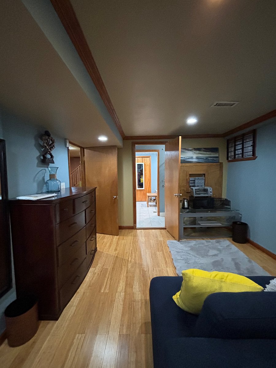 Small kitchenette with microwave, small refrigerator, toaster oven, electric kettle and Buffet caddy