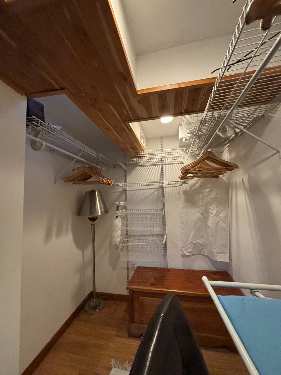 Left side of walk- in closet