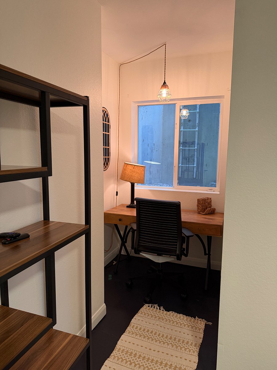 Workspace nook and emergency exit.