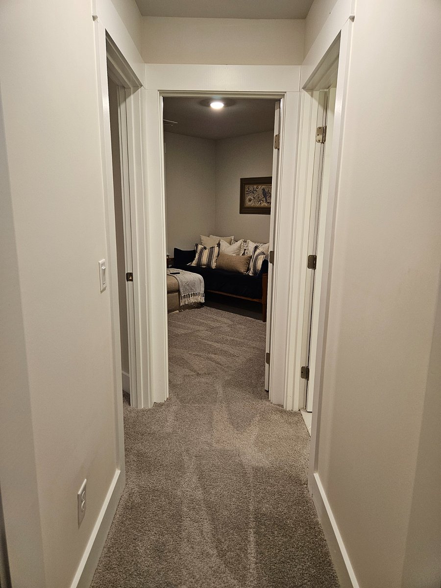 The back of my home truly is your own wing. Bedroom, TV room & bathroom all down your own hallway via the loft. Laundry room upstairs off loft as well.
