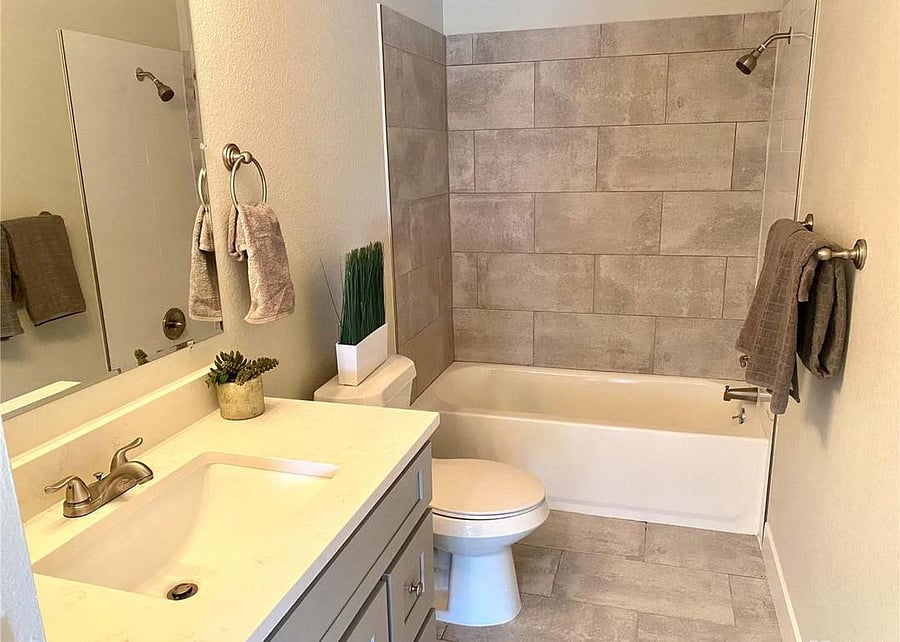 Upstairs bathroom with tub