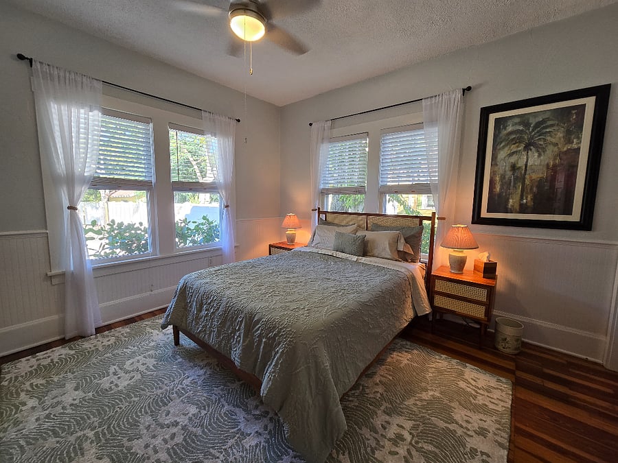 queen-size primary bedroom with walk-in closet 