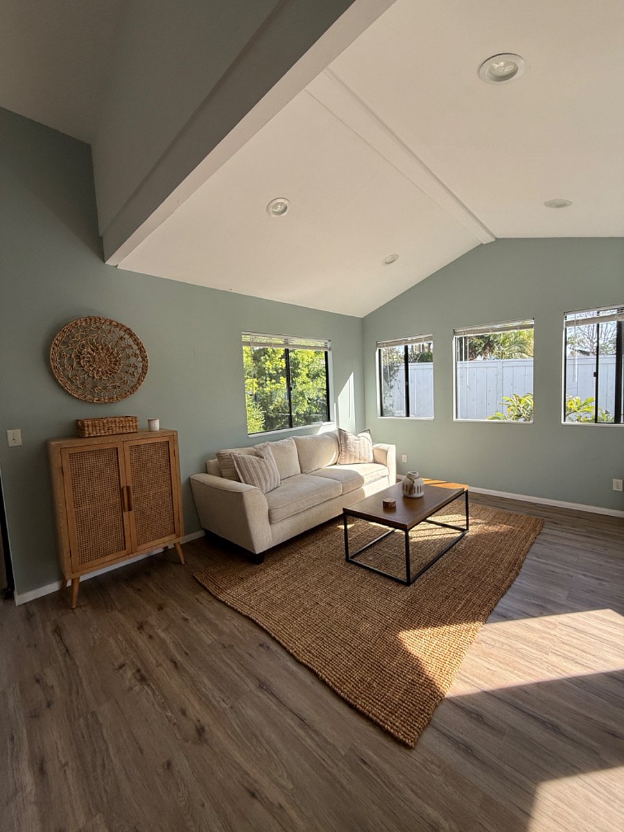 Lots of light in the living room with option to close the blinds. Property is fenced in and private even with windows opened.