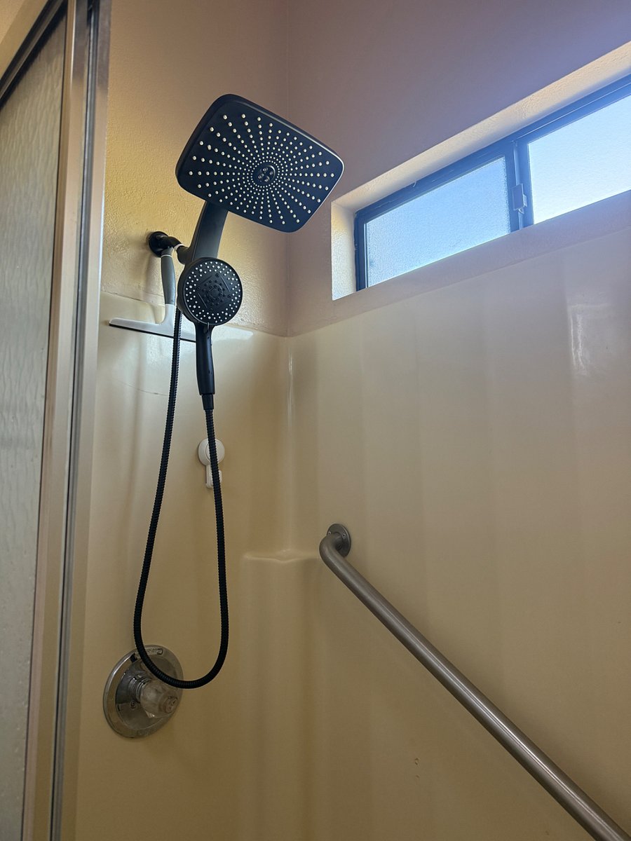 new shower head installed with great pressure.