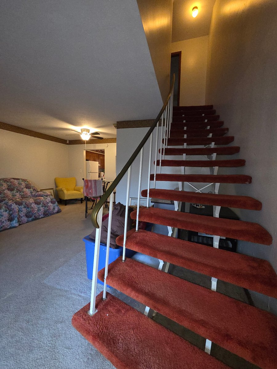 Stairs leading to bedrooms