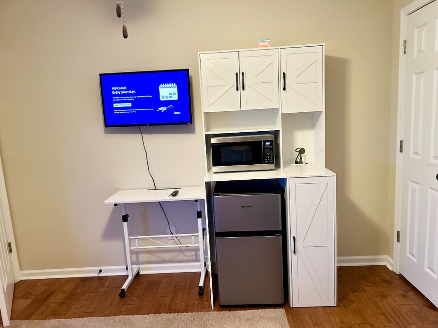 Mini-fridge cabinet with plenty of storage and power strip
