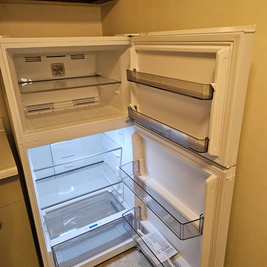 Brand new refrigerator to keep all your food and beverages.