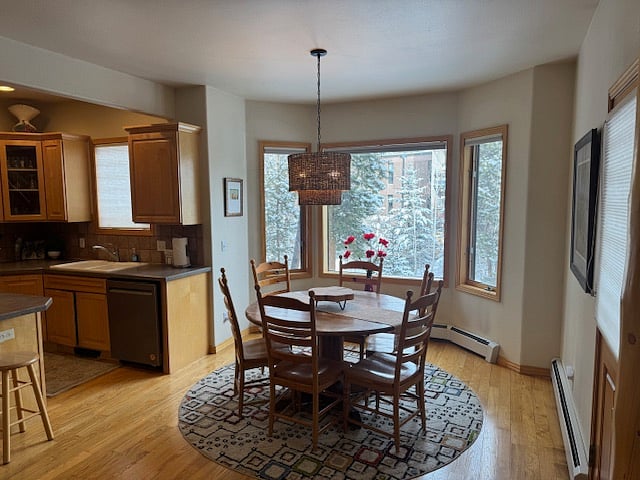 Dining area overlooking the private back yard adjoining Ten Mile Creek.