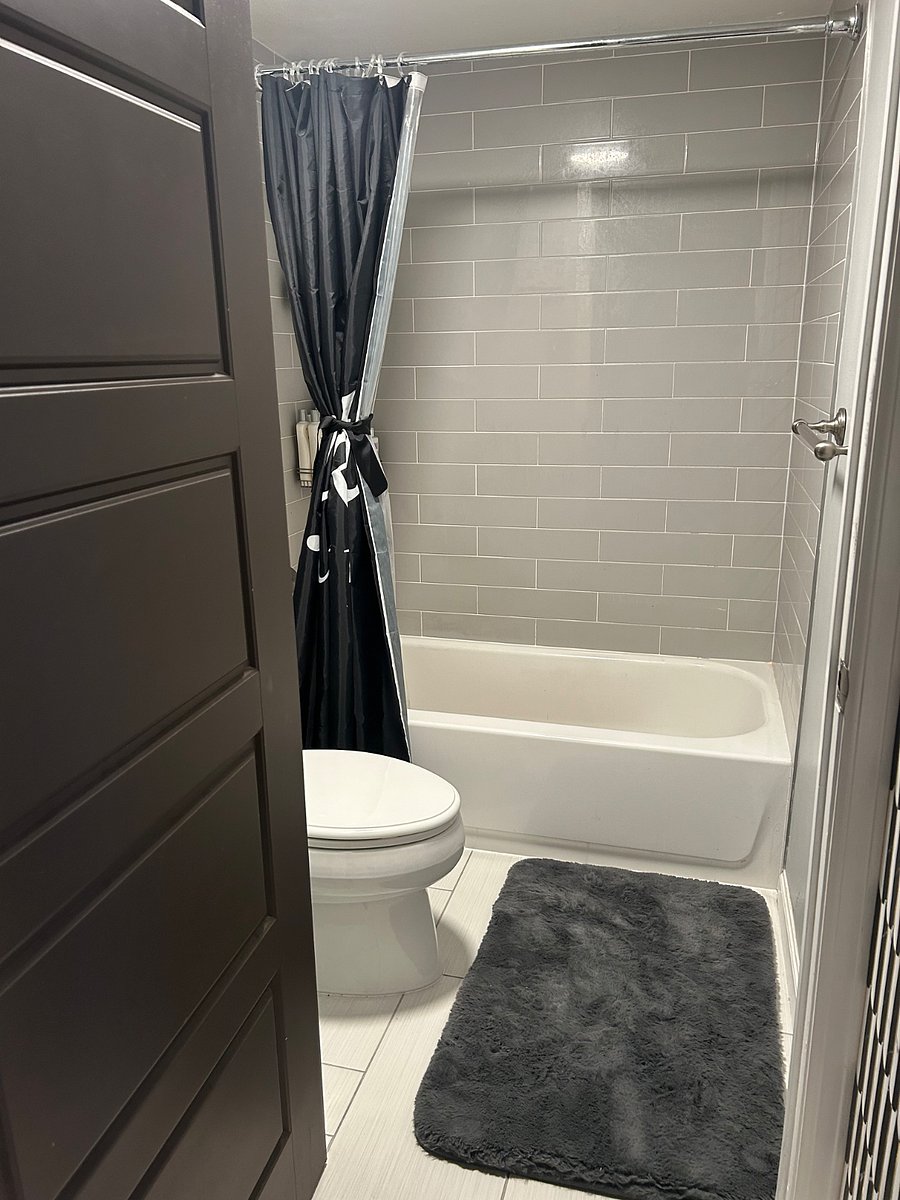 Floating shelves above toilet for storage and towels