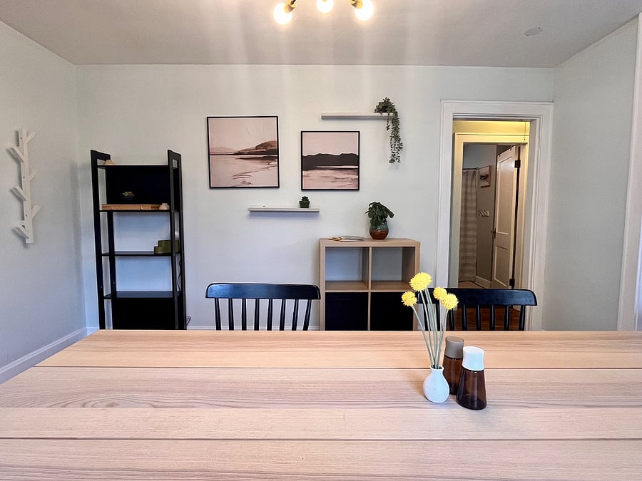 View from dining room of hall way leading to bedrooms and bathroom.
