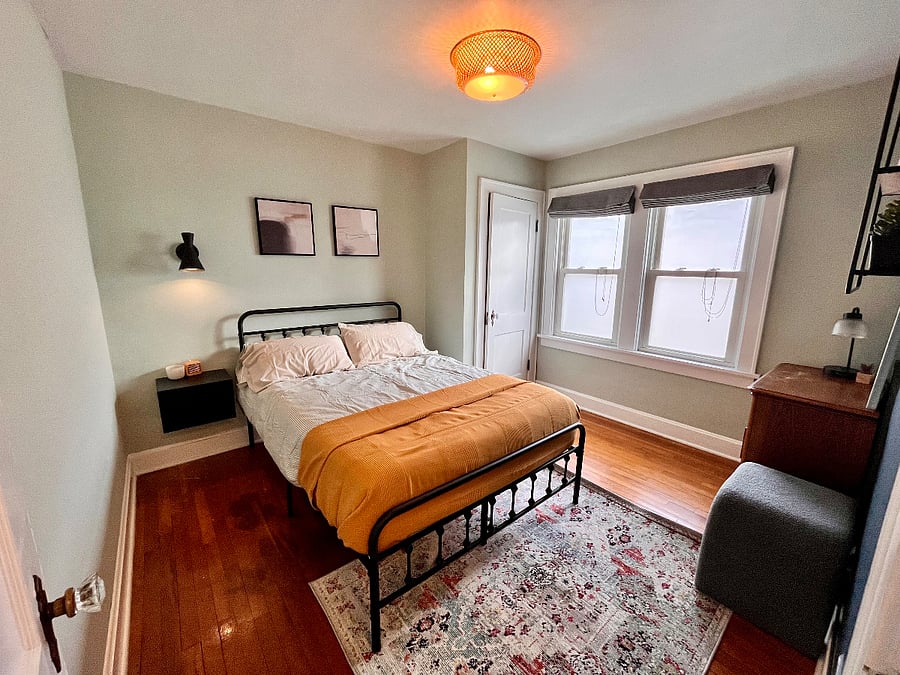 2nd Bedroom to the left of bathroom. Vintage Dresser and Full size memory foam mattress.