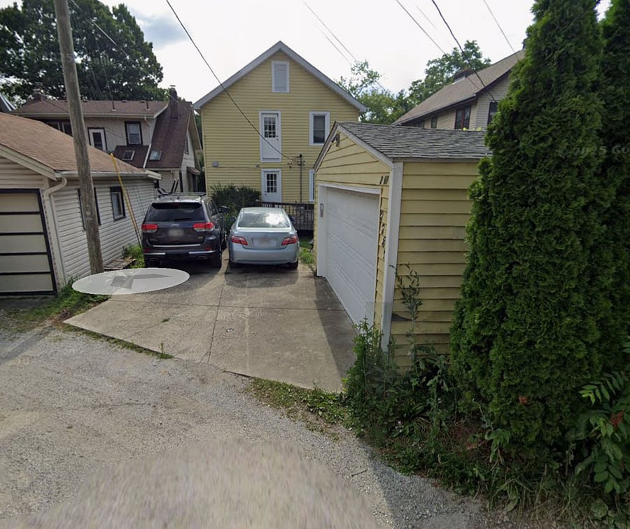 Access to the 2 car garage from the alley located off Olentangy Street.
(Note: Parking pad is for the Bottom Unit ONLY- No Guest parking) 
Free street parking is available on Olentangy St. & Indianola Ave.