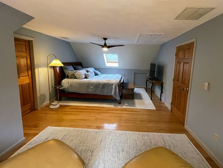 View of master bedroom from loungers - walkin closet is on the left
