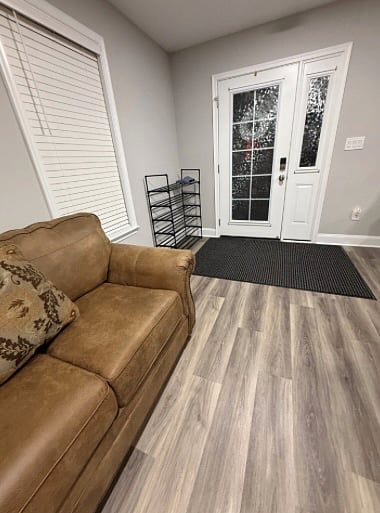 Front Door Entry includes a shoe rack and a floor mat on which to remove or put on your outdoor footwear.