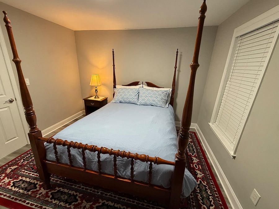 Bedroom 3: queen four-poster bed.
