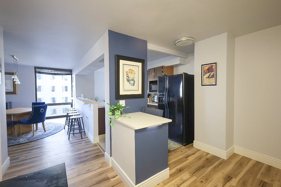Enter your new space to plenty of outside light. Entry hallway desk is perfect for setting up a laptop and collecting the mail.