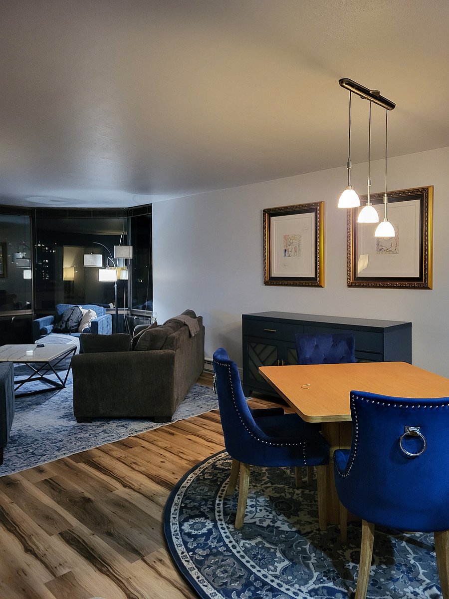 The living room and dining room are even more charming at night.