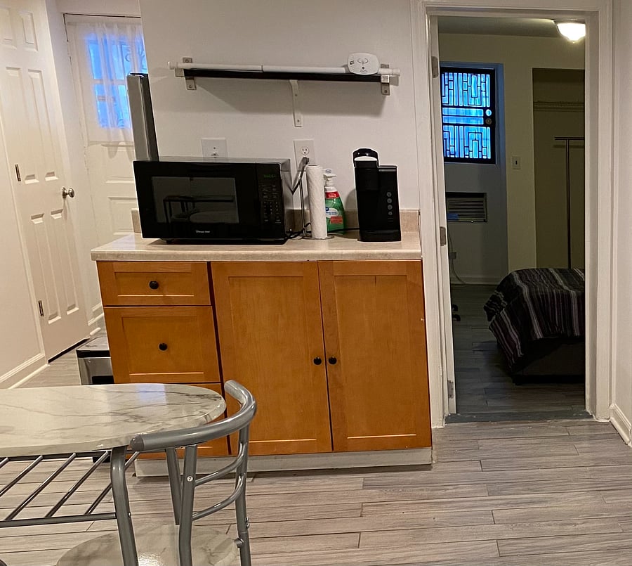 Cabinet with micorwave and coffee station, in living area
