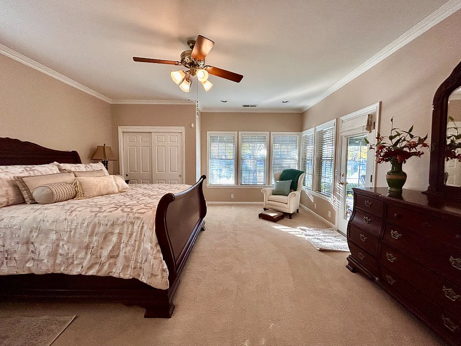Primary Bedroom - King Sleigh Bed and Lake Views