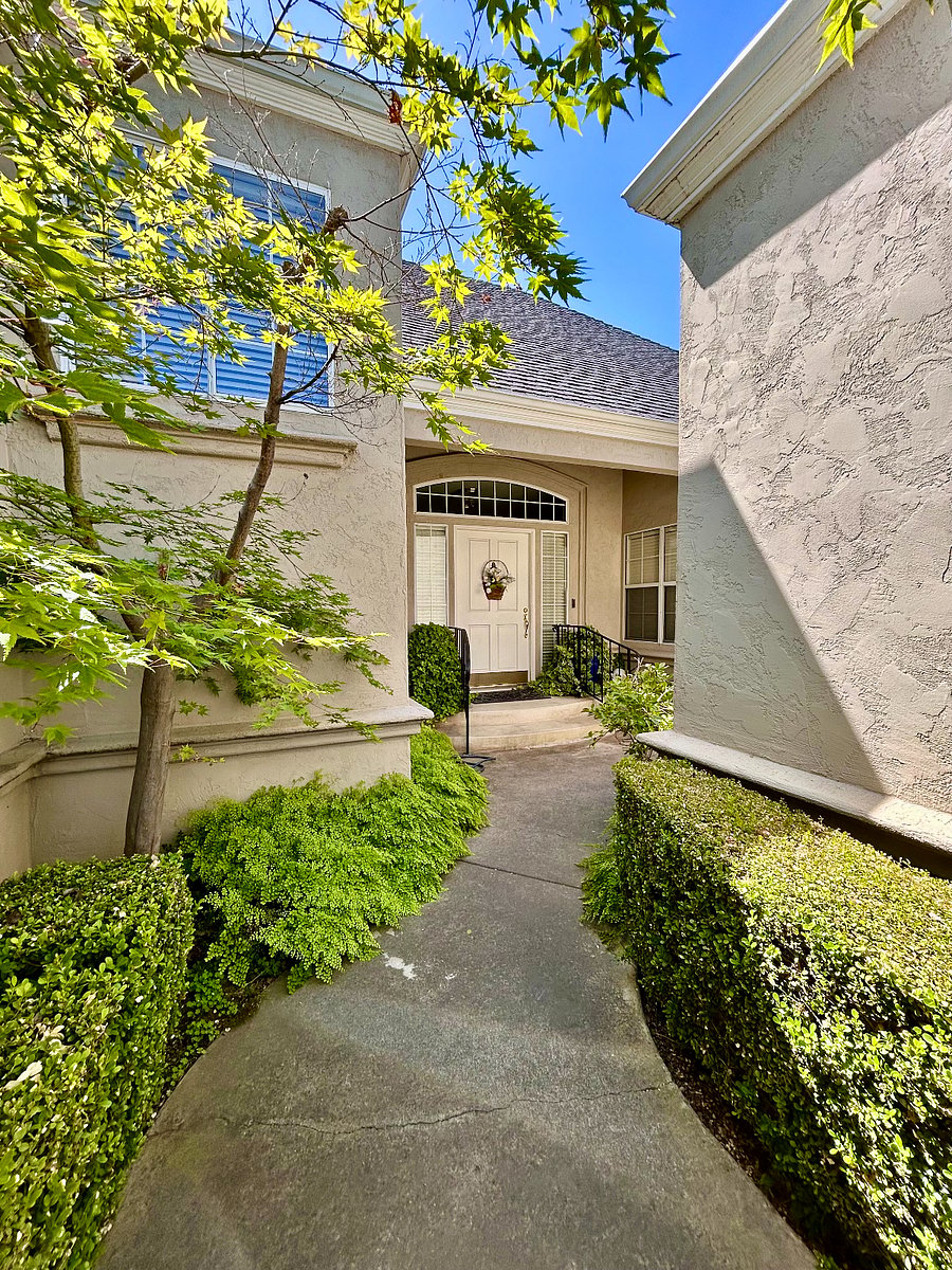 Private courtyard entry with lock box for key access