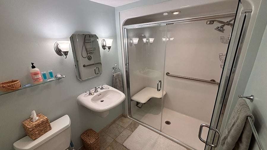 1st floor handicap accessible bathroom with fold up shower seat