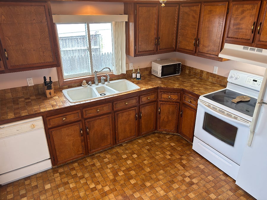 Kitchen contains all necessary items, coffee maker, microwave, pots and pans, knives, glasses and basic cleaning products