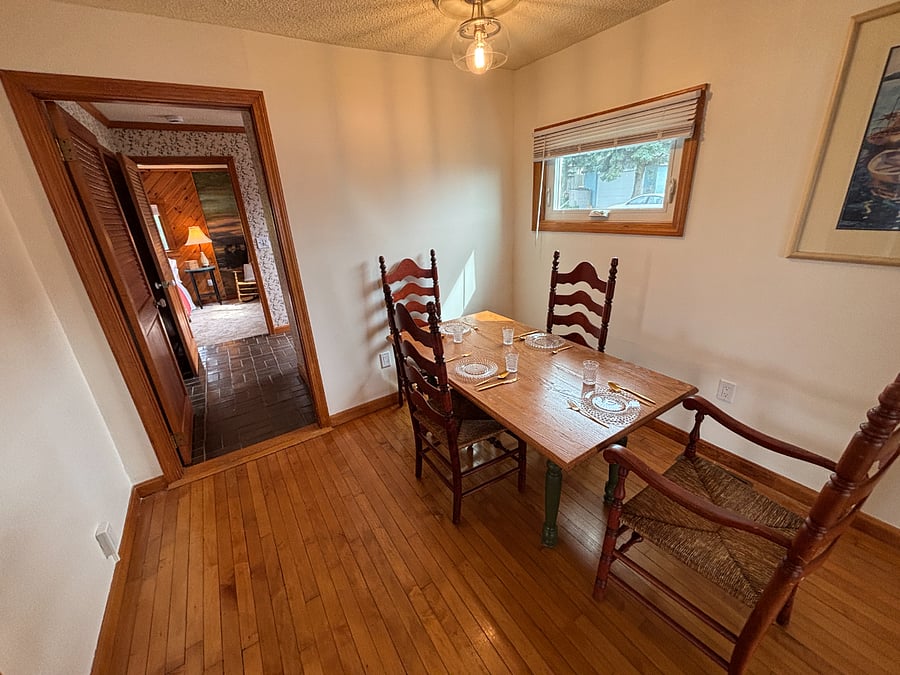 Back hallway with washer dryer  is located between dining and master bedroom