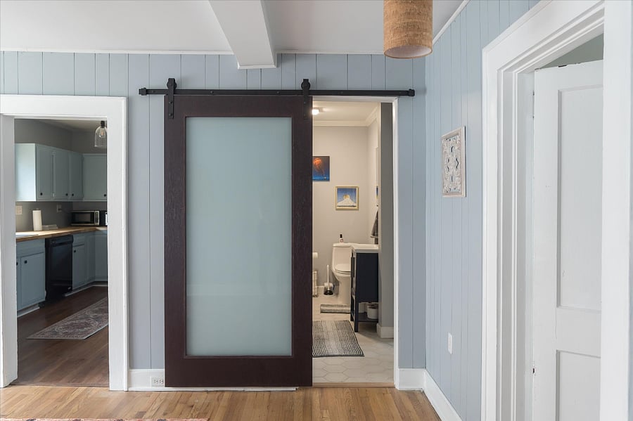 Full bathroom with laundry inside