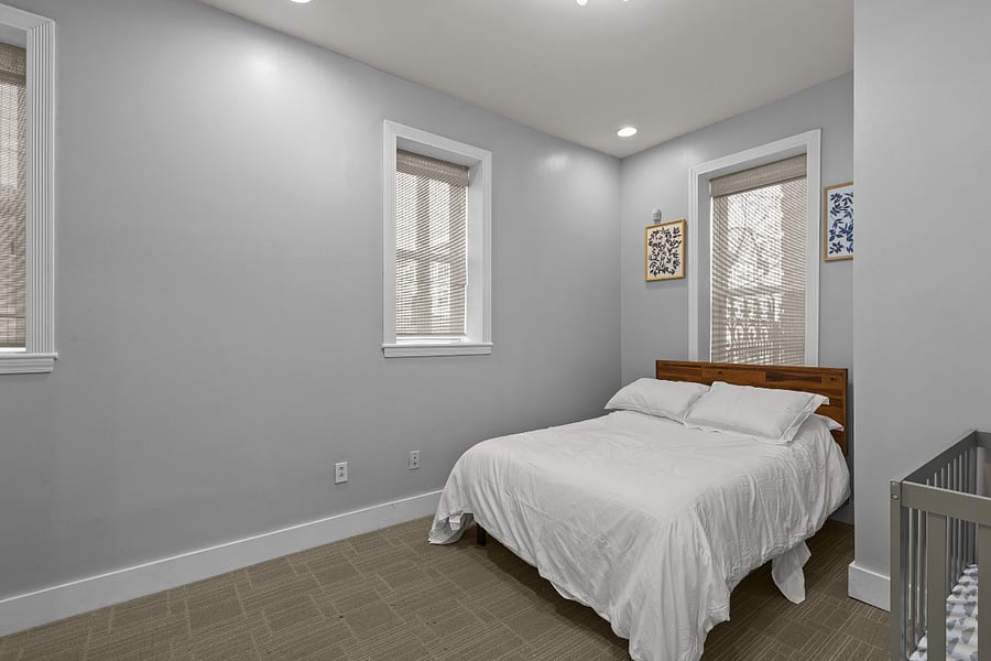 Second bedroom on second floor with queen bed