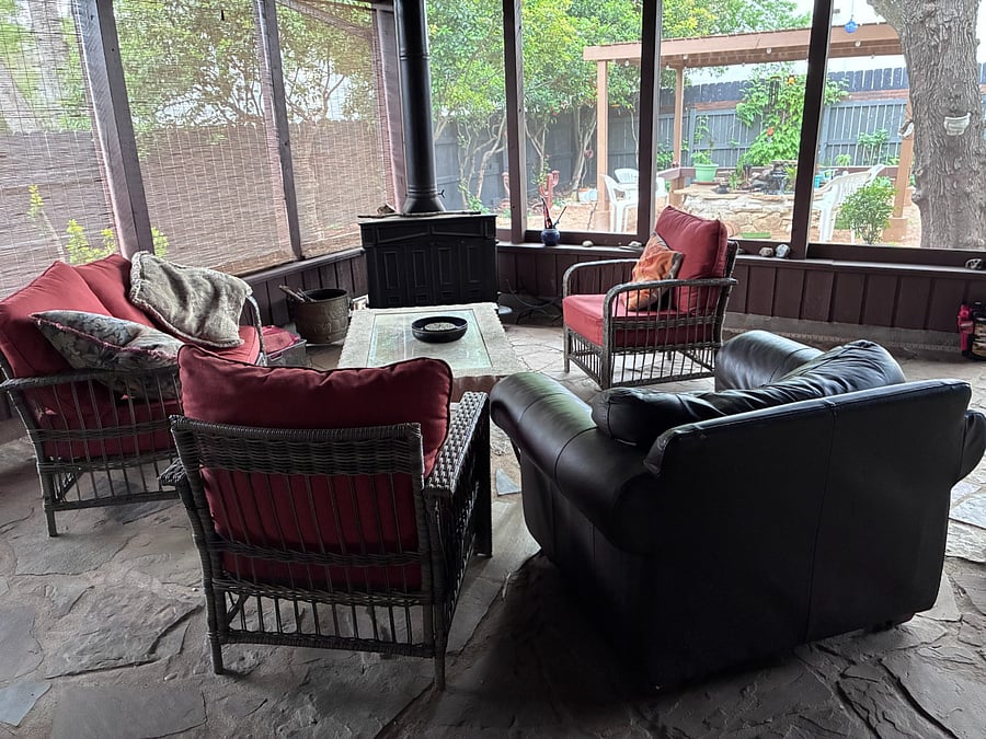 Outdoor Woodburning Stove with Seating Area, Coffee Table, Enclosed Flagstone Patio