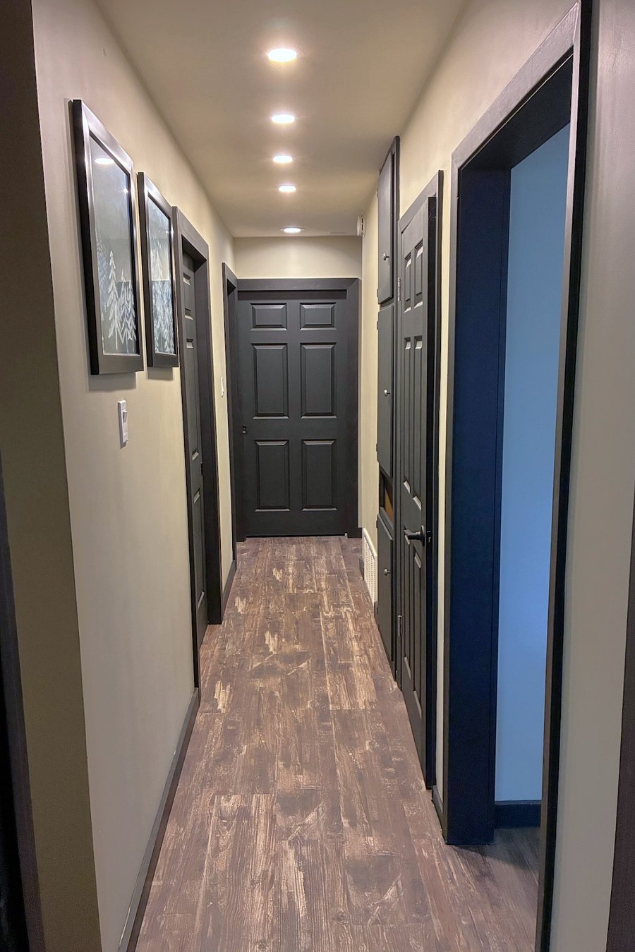 Hallway with available closets