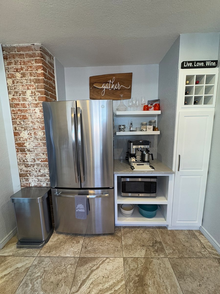 Character meets practicality with ample storage, wine rack, coffee station and microwave