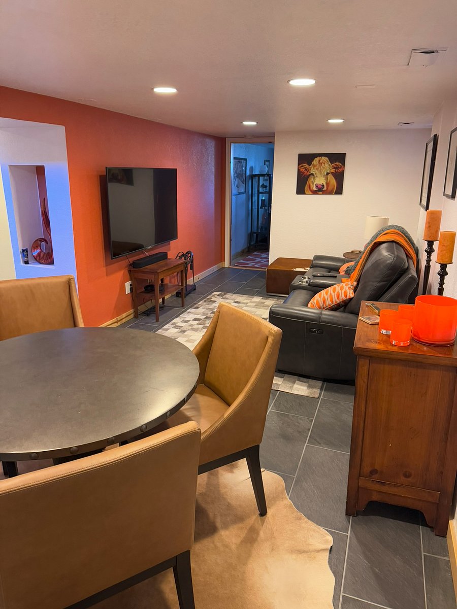 Second living space with Smart TV, leather recliners perfect for movie nights