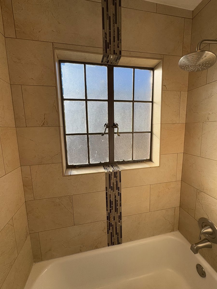 Bathtub and shower in upstairs bath