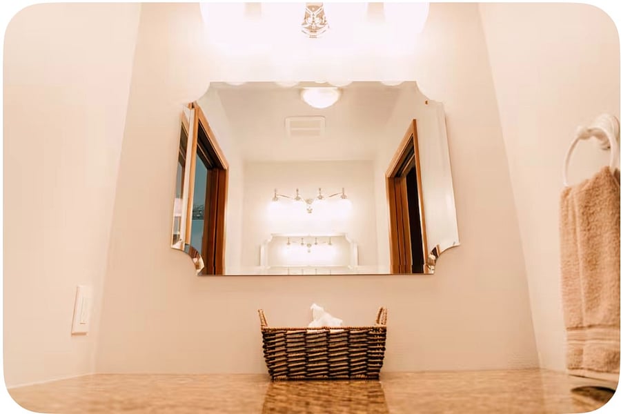 Bathroom counter space with size mirror
