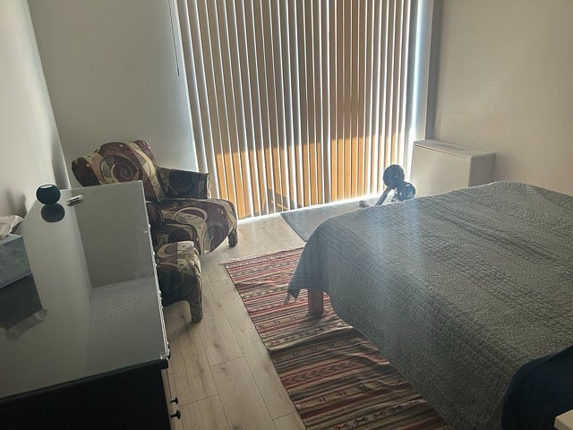 Bedroom with easy acccess to balcony.