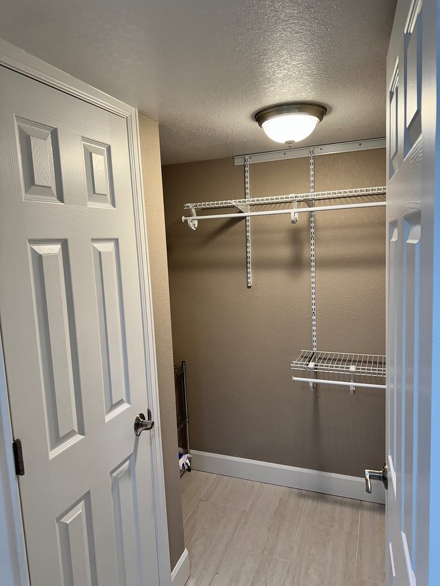 Storage closet and linen closet behind the door.