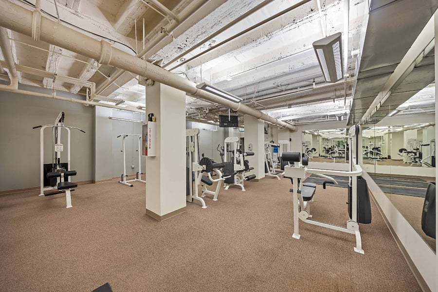 Full workout gym with a sauna located in the basement of the building.