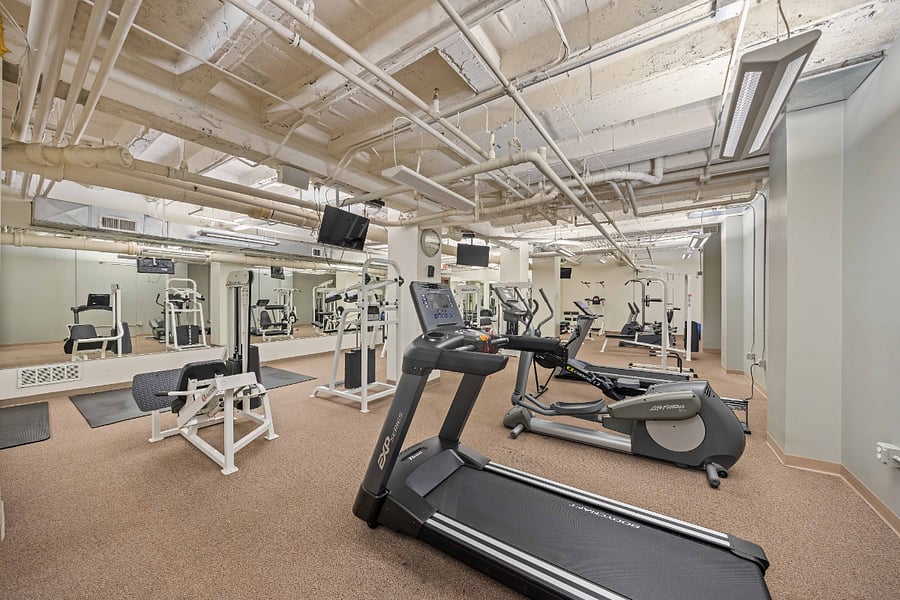 Full workout gym with a sauna located in the basement of the building.