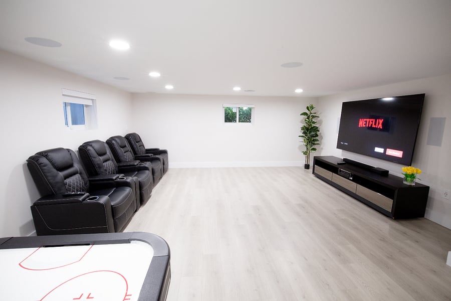 Basement 75 inch TV with Surround sound system.