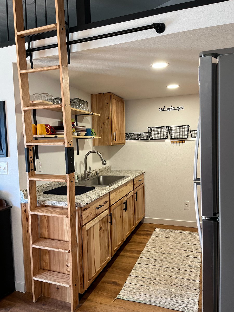 Ladder moved aside and locked in place when not needed