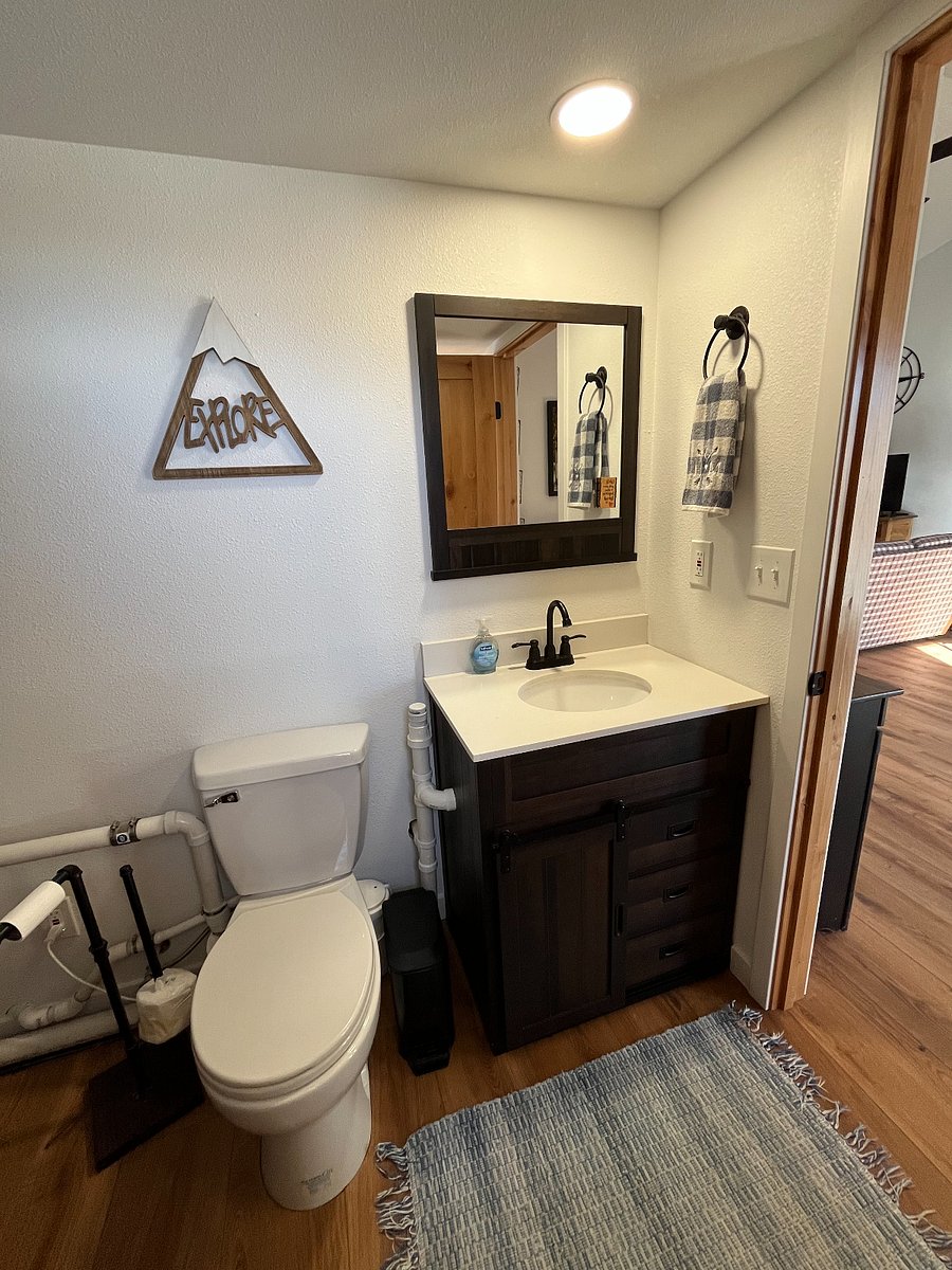 Bathroom -- sink vanity w/ some storage space