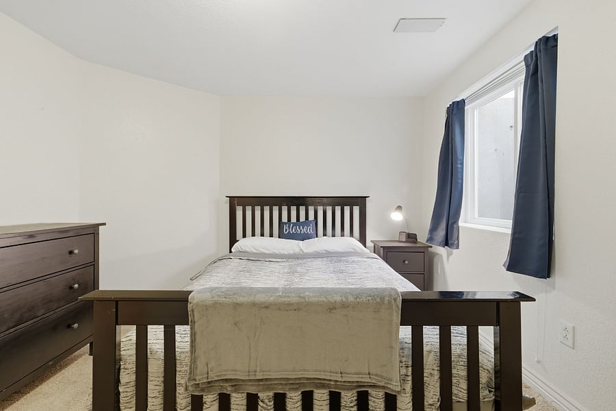 Bedroom with natural light and additional storage