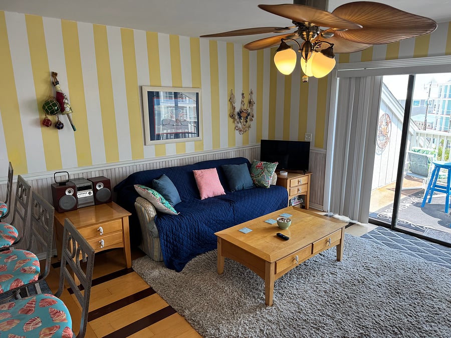 Living Room With Smart TV & Queen Sized Sleeper Sofa