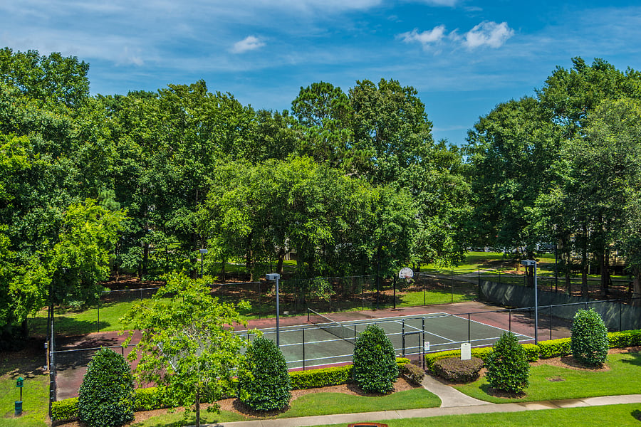 Well-maintained tennis courts within the community