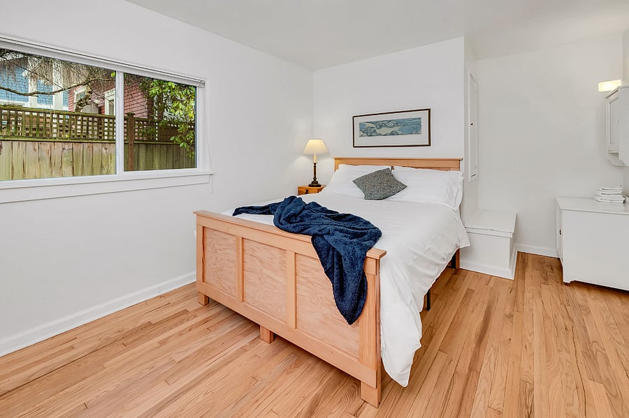 Bedroom #2 with queen bed and vanity