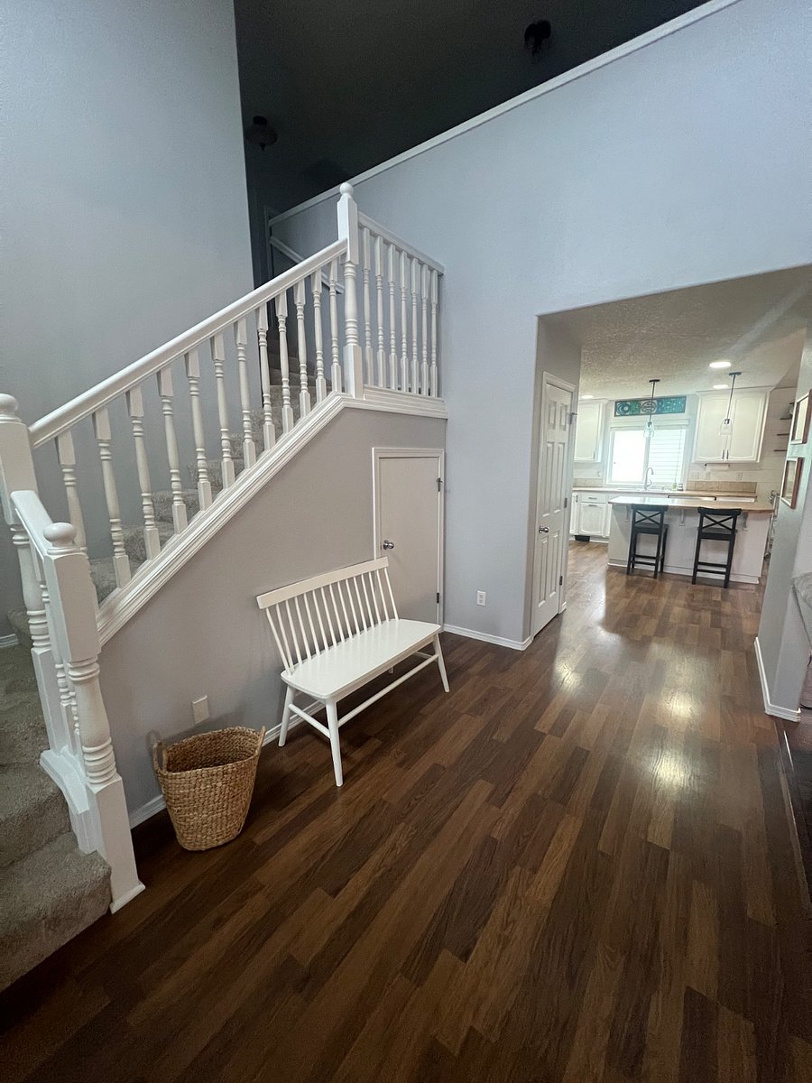 Front door entry way and stairway to second level