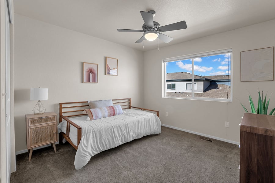 Bedroom #3 featuring a twin daybed, dresser and full closet