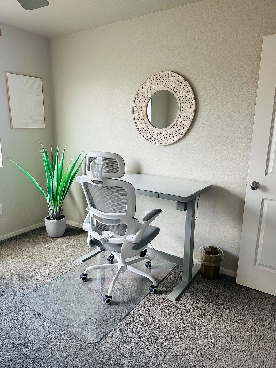 Dedicated workspace with standing desk.